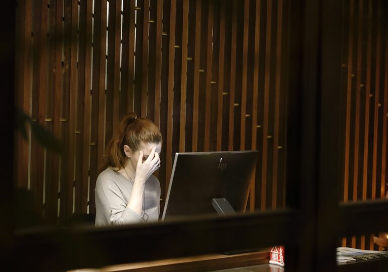 Burned out employee in office